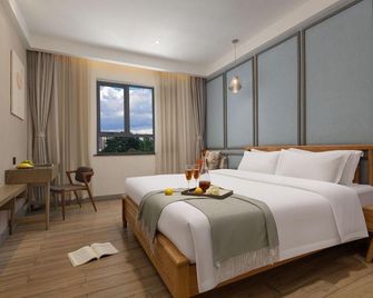Ge Shang Hotel - Changsha - Habitació
