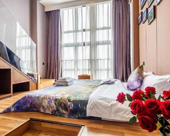 Lavendar Duplex Apartment - Guangzhou - Yatak Odası