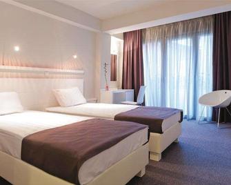 هوتل ليوناردو - سكوبي - غرفة نوم