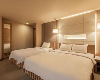 كايندنيس هوتل ساندو شوبينج ديستريكت - مدينة كاوهسيونغ - غرفة نوم