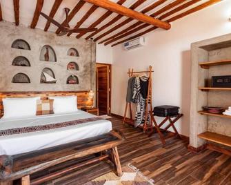 Casa Ananda Boutique Hotel - Пає - Спальня
