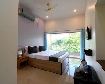 Bonobitaan Hotel & Restaurant - Bolpur - Bedroom