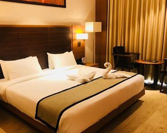Grand Tamanna Hotel - Hinjewadi - Bedroom
