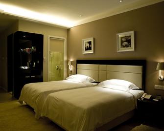 Kaiman Hotel - Zhuhai - Bedroom
