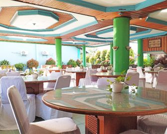 Capital O 91806 Hotel Batu Suli - Palangkaraya - Restaurant