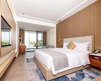 Qionghai Hotel - Liangshan - Bedroom