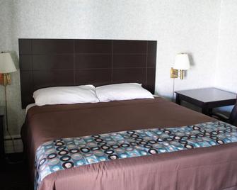 Wagon Wheel Inn - לנוקס - חדר שינה