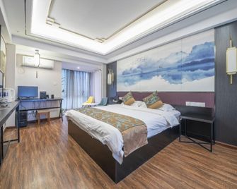 Jingshiji Express Hotel - Xishuangbanna - Ložnice