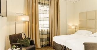 Hotel Cosmopolitan - Florenz - Schlafzimmer