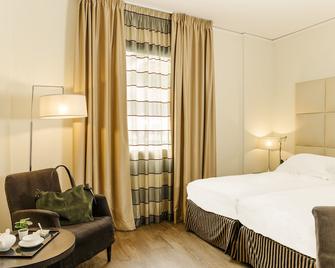 Cosmopolitan Hotel - Florenz - Schlafzimmer