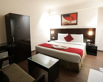 Anr Hotels - Lucknow - Phòng ngủ