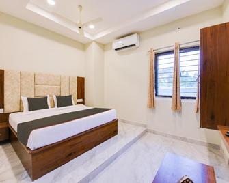 Collection O Simhadri Grand - Khammam - Bedroom