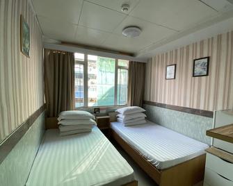 Geo-Home Holiday Hotel - Hong Kong - חדר שינה