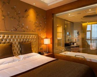 Binjiang International Hotel - Zaozhuang - Bedroom