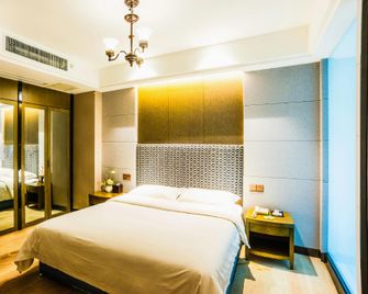 Jin Tai Long International Hotel - Nanjing - Schlafzimmer