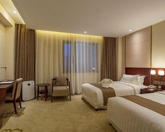 Beijing Yishang Nuolin Hotel - Pekín - Habitación