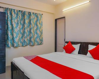 Hotel O Ema Happy Stay - Pune - Bedroom
