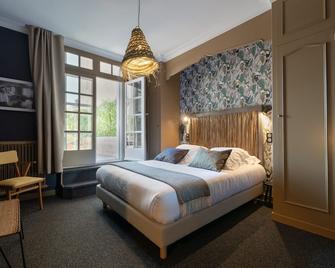 أوتل سانت جولين - أنجيه - غرفة نوم