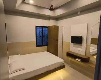 Prerna Cottage & Lodge By Grb - Solāpur - Bedroom