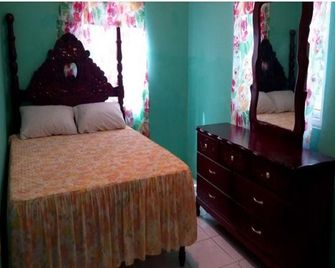 Reggae Moon Guesthouse - Falmouth - Camera da letto