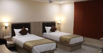 Hotel Royal Heritage - Guwahati - Camera da letto