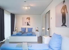 Hitrental Allmend Comfort Apartments - Lucerne - Bedroom