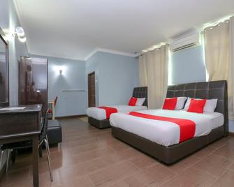 OYO 90145 D'sofwa Inn - Jerteh - Bedroom