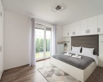 Metro Bemowo Apartment with Garden by BookingHost - Warsaw - Bedroom
