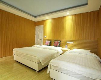 Xijiehoujie Hostel - Guilin - Soverom