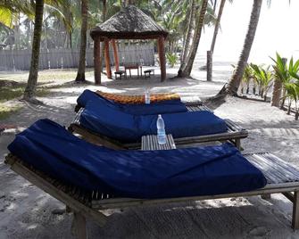 The coconut plantation of Assinie - Assinie-Mafia - Patio