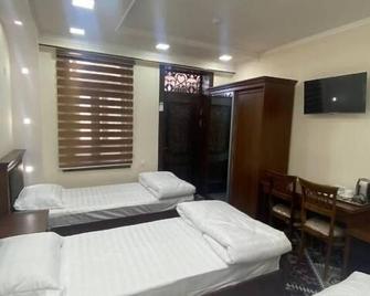 Vostok Hotel - Buchara - Schlafzimmer