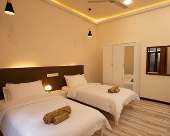 The Bilimbi Guesthouse & Inn - Huraa - Slaapkamer
