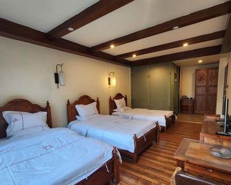 Qingshu Garden Hotel - Ngawa - Bedroom