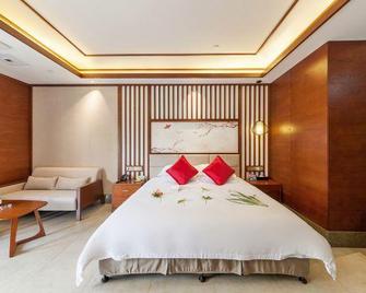 Southeast Huadu Hot Spring Hotel - Zhangzhou - Slaapkamer