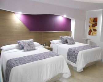 Hotel Magico Inn - Oaxtepec - Спальня