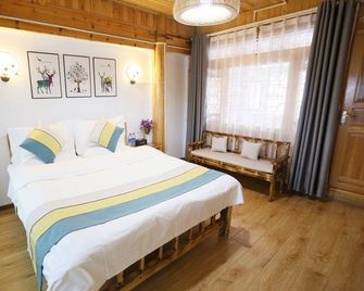 Youyisu Boutique Inn - Lijiang - Bedroom