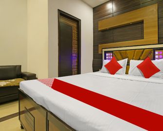 Hotel O Dream'z Residency - 루디아나 - 침실