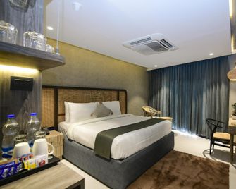 Origin Boutique Hotel - Baga - Slaapkamer