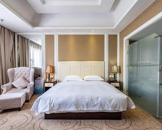 Anji International Holiday Hotel - Huzhou - Schlafzimmer