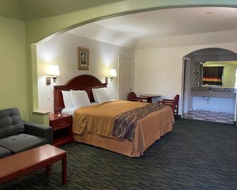 Executive Inn And Suites - Porter - Bedroom