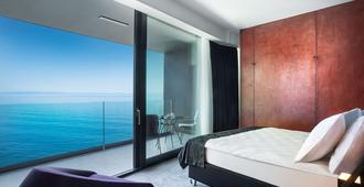Design Hotel Navis - אופטייה - חדר שינה