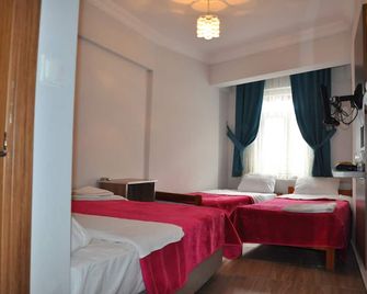 Hotel Altug - Isparta - Schlafzimmer