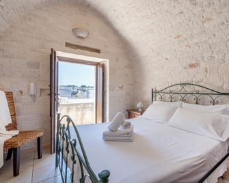 Trulli Contento - Rooms & Apartments - Alberobello - Schlafzimmer