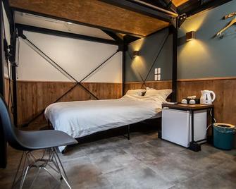 Resort Inn Iriomotejima - Taketomi - Ložnice