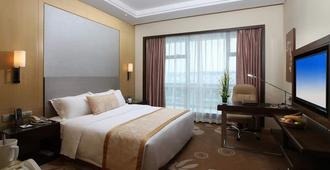 International Airport Garden Hotel - Xiamen - Schlafzimmer