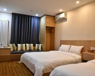 Qinglian Furun Hotel (Beijing Caishikou) - בייג'ין - חדר שינה