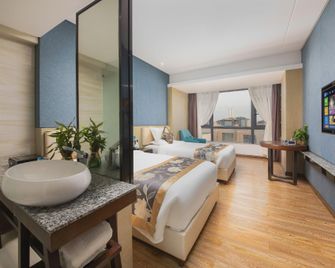 Yiyuan Lanbao Hotel - Lingshui - Schlafzimmer