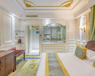 Succeed Hotel - Tangshan - Camera da letto