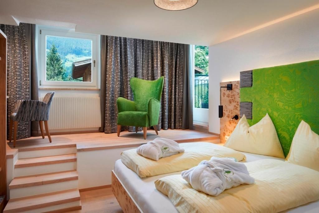 Genusshotel Fichtenhof - גרוסארל - חדר שינה