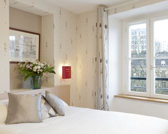 فندق لوجي دوكين - نانت - غرفة نوم